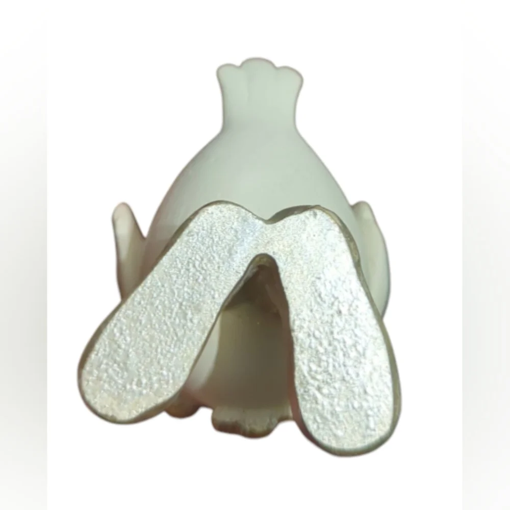 White And Silver Bird Figurine With Gold Accents.